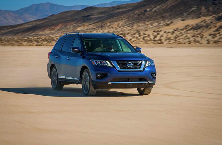 2018 Nissan Pathfinder Dark Exterior Side View on Sandy Surface