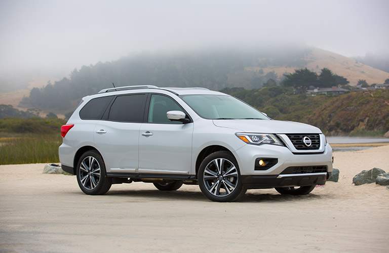 2018 Nissan Pathfinder White Exterior Side View on Sandy Surface