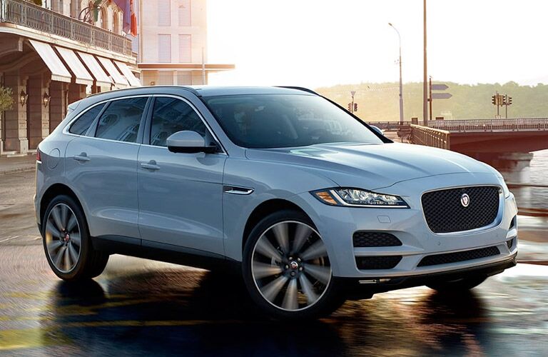 2018 Jaguar F-PACE driving on waterfront road