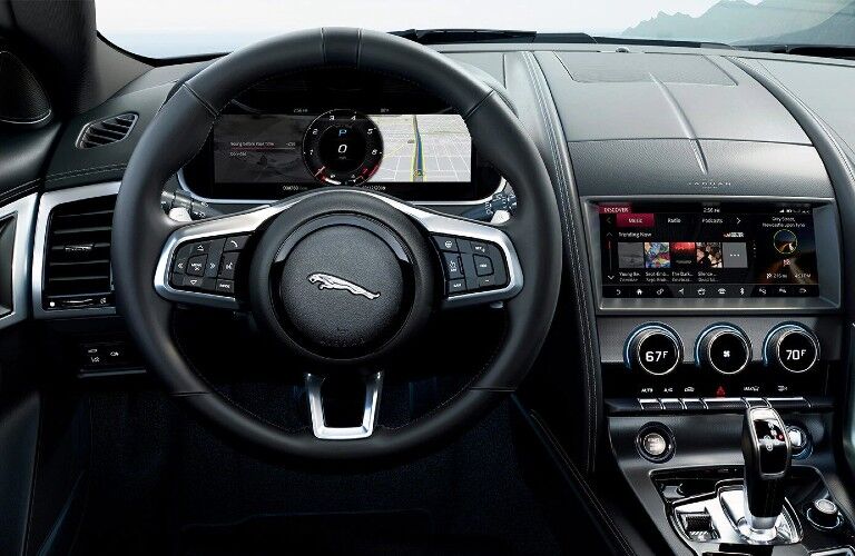 Steering wheel, gauges, and touchscreen in 2021 Jaguar F-TYPE