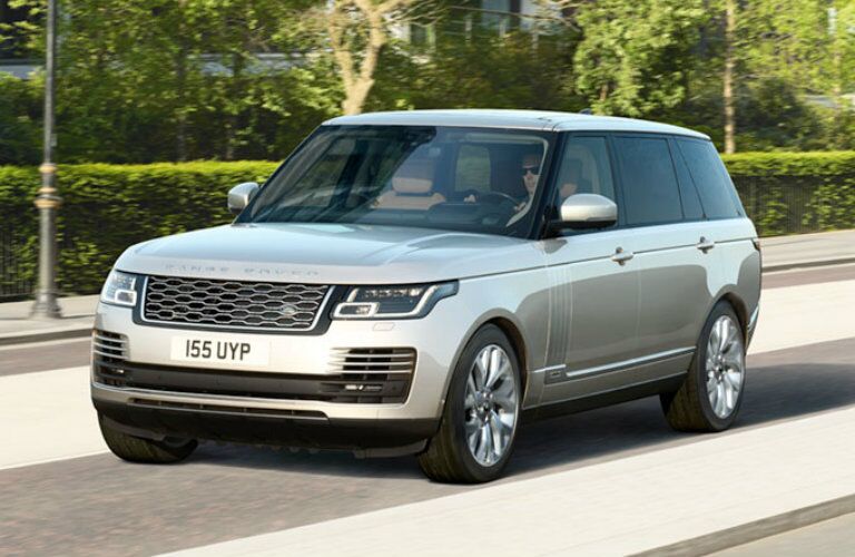 Front view of 2019 Land Rover Range Rover PHEV driving on parkway