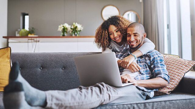 Car Shopping Couple on Couch