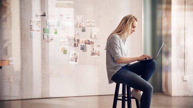 Woman Shopping on Laptop