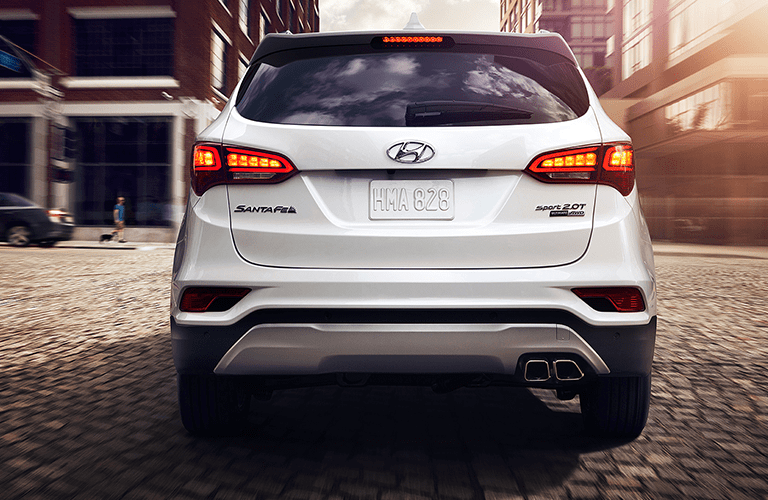 rear of white hyundai santa fe