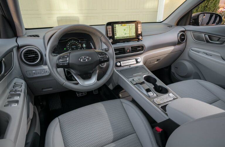 Touchscreen and steering wheel inside the Kona Electric