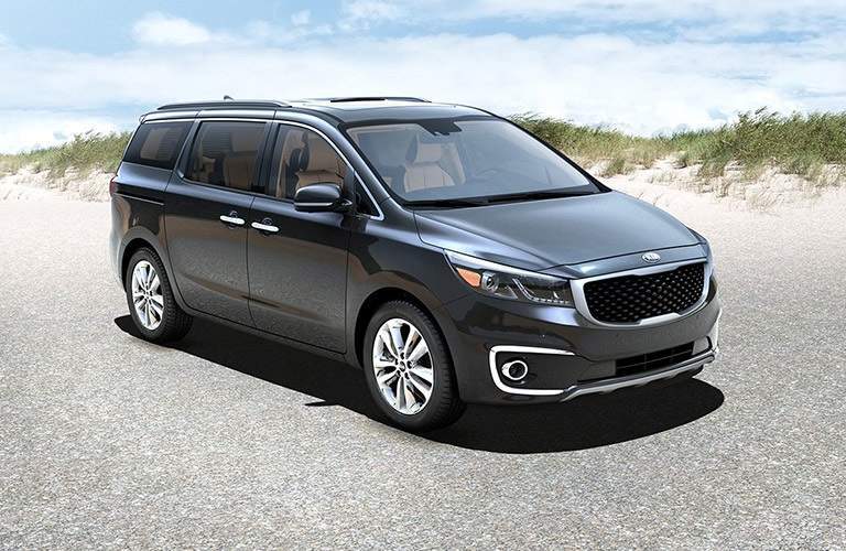 2018 Kia Sedona parked showing side and front profile