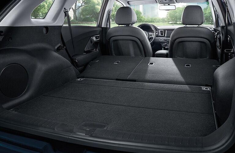 Rear seats folded down inside 2019 Kia Niro