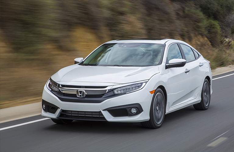 White 2018 Honda Civic Sedan on road