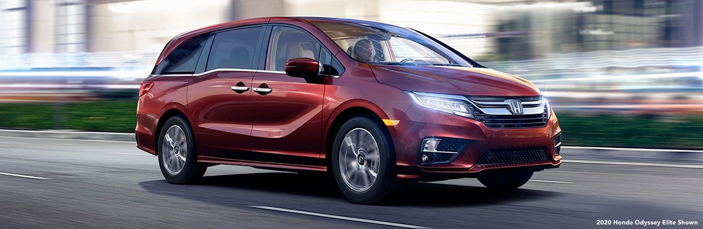 2020 Honda Odyssey Elite Red Paint Driving Down Road Lights On