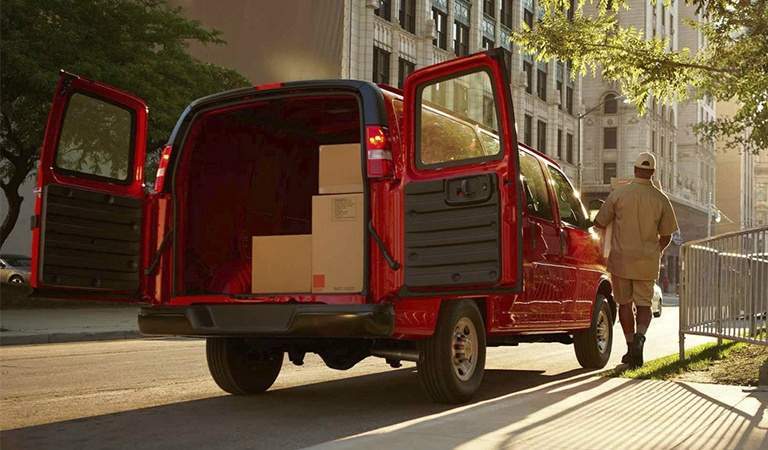 2017 Chevy Express red with back doors open