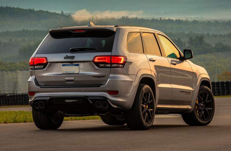 Rear view of 2018 Jeep Cherokee at dusk