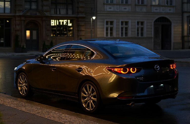 A left rear quarter photo of the 2020 Mazda3 Sedan.