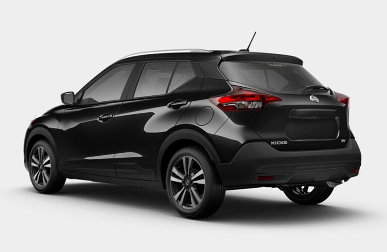 side and rear of the 2018 Nissan Kicks SV on a grey background