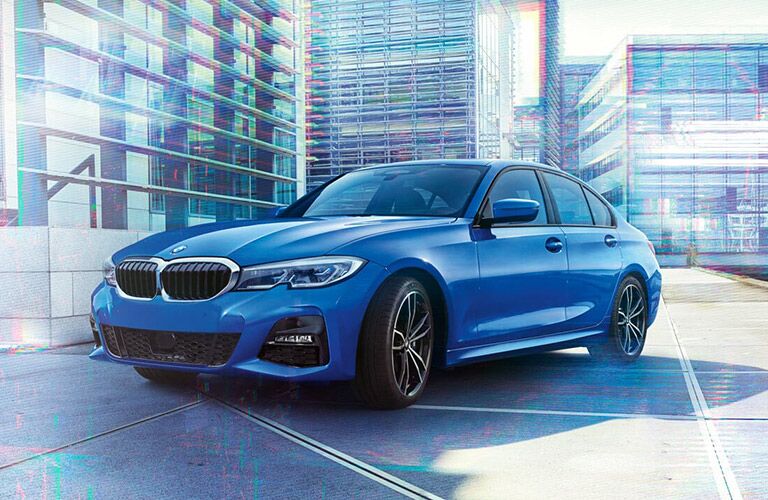 BMW 3 series blue side front view
