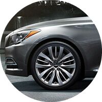 2016 Hyundai Genesis front headlight and wheel closeup from side