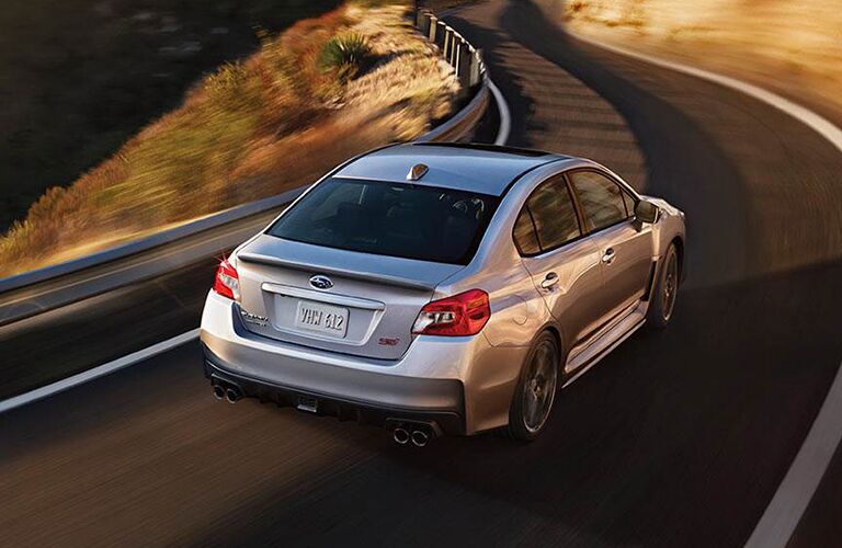 2019 Subaru WRX seen from the top rear rounding a curve