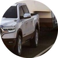 cropped image of 2019 Ram 1500 towing a trailer