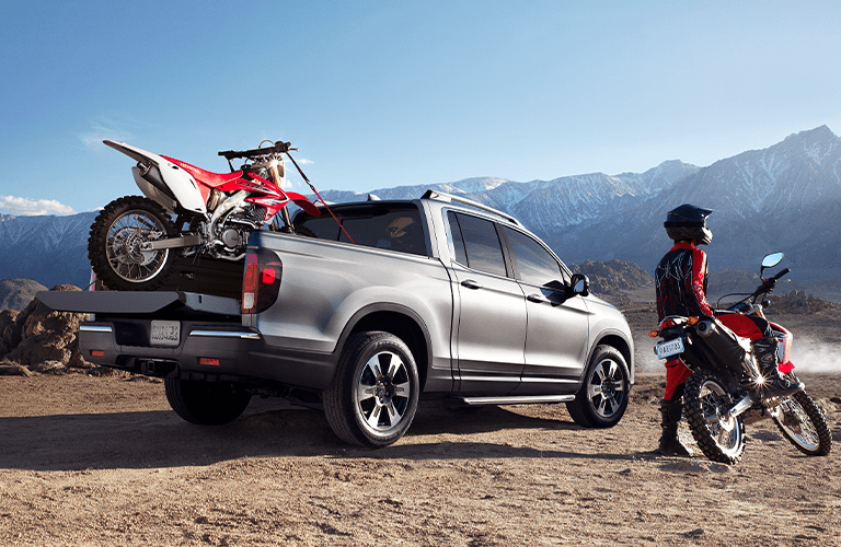 Honda Ridgeline silver back view