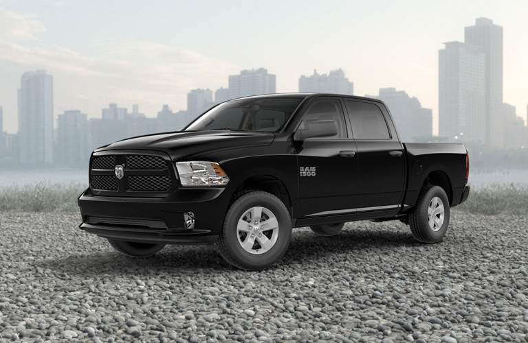 black ram 1500 parked on gravel