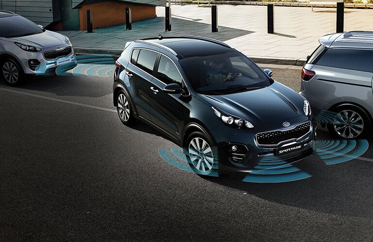 black 2018 kia sportage parallel parking with park assist sensors
