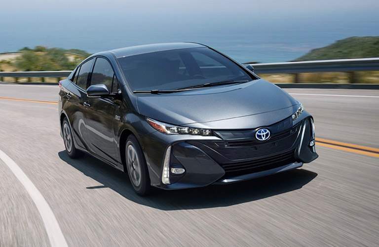 2018 Toyota Prius Prime driving on a curving road