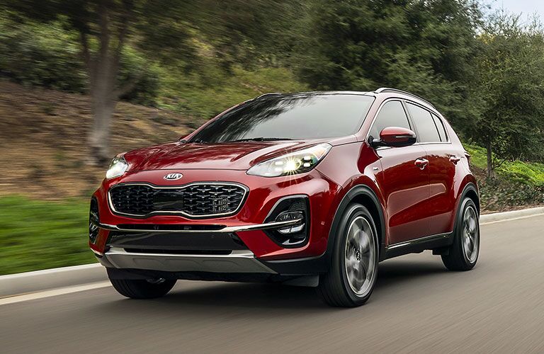 2020 Kia Sportage driving down road
