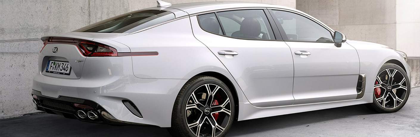 white 2018 Kia stinger parked outside