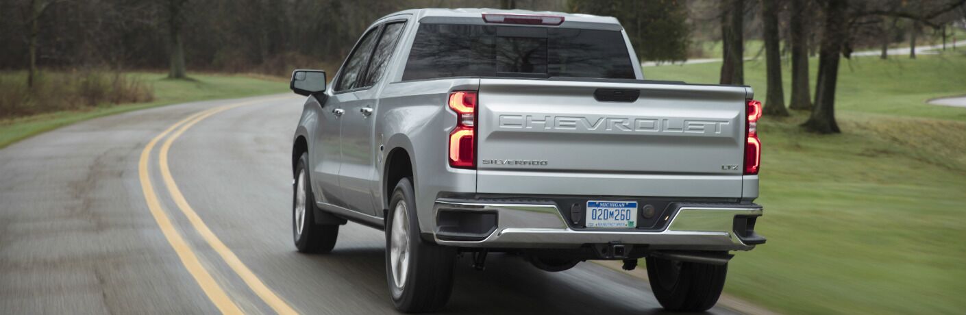2019 Chevrolet Silverado 1500 driving by a park