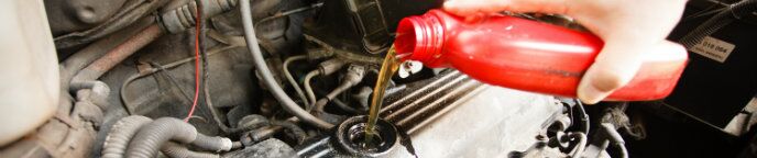 pouring engine oil