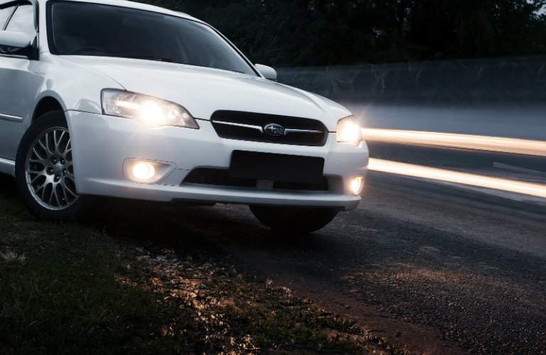 Subaru Legacy on a Dirt Road