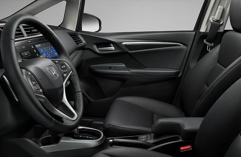 black front seats and steering wheel in honda fit