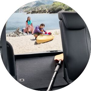 view from honda hr-v cargo area of man and a kayak