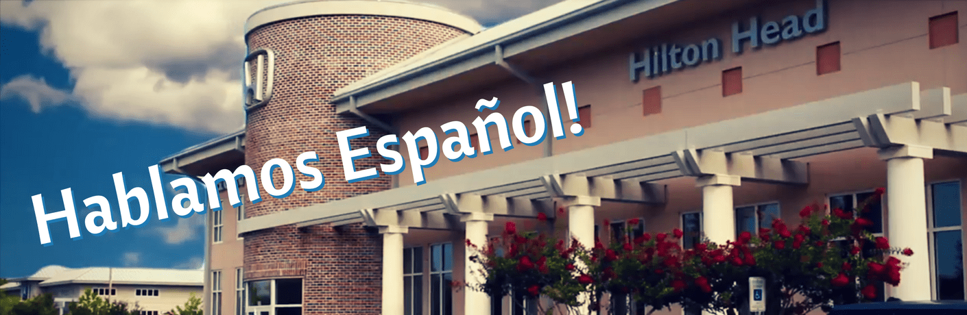 view outside of Hilton Head Honda with text overlaid saying hablamos espanol