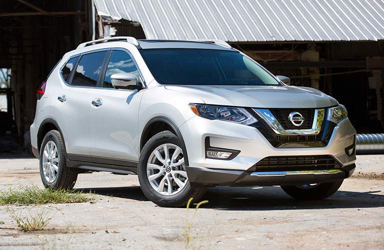 2018 Nissan Rogue parked on a warehouse.