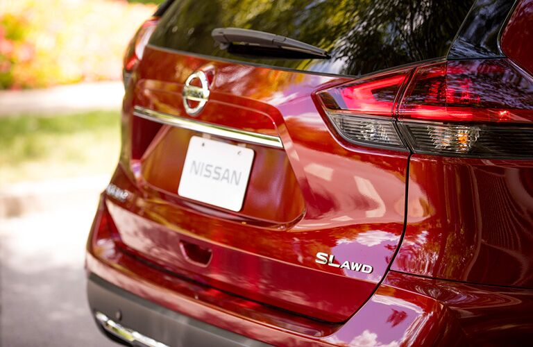 rear bumper of red nissan rogue