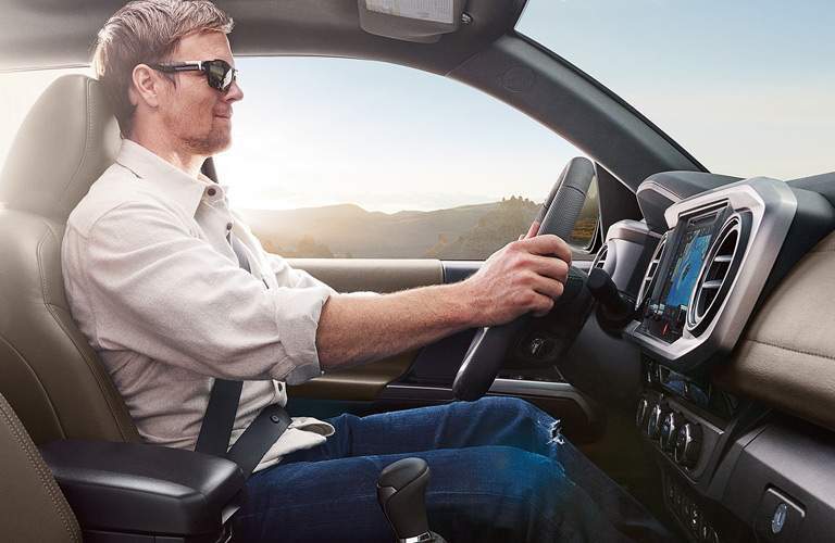 Man behind the wheel of the 2017 Toyota Tacoma