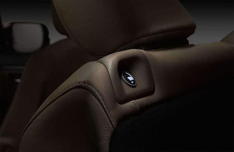 Button on back of seat in 2017 Honda EX-L