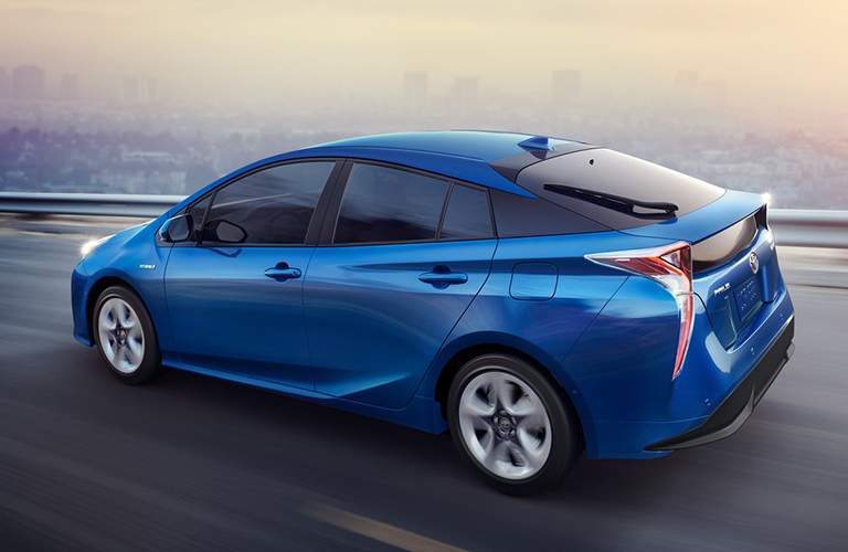 2018 Toyota Prius driving down the highway