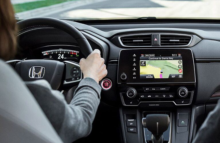A woman behind the wheel of the 2020 Honda CR-V