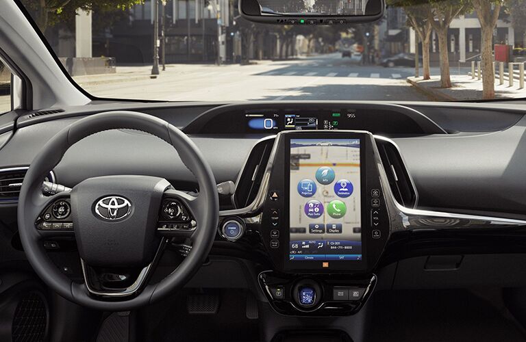 View of the steering wheel and touchscreen in the 2020 Toyota Prius
