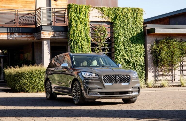 2020 Lincoln Aviator parked in front of a house