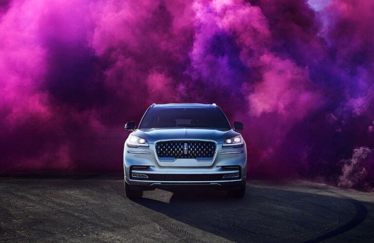 2020 Lincoln Aviator surrounded by pink smoke