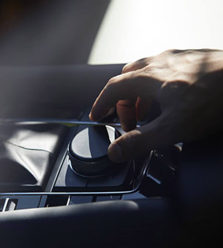 2019 Mazda3 traction control knob being adjusted