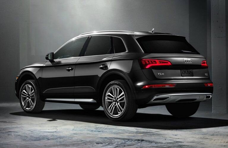 black Audi Q5 parked in dark garage