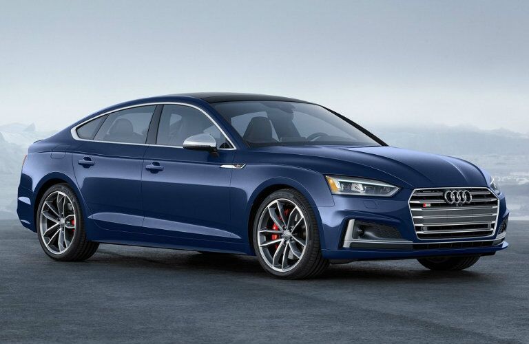 dark blue Audi S5 parked in open area