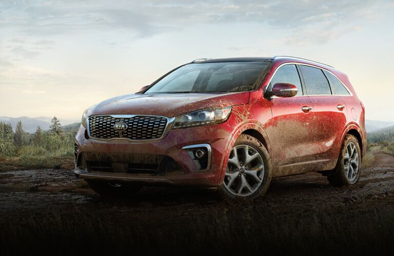 Red 2020 Kia Sorento covered in mud