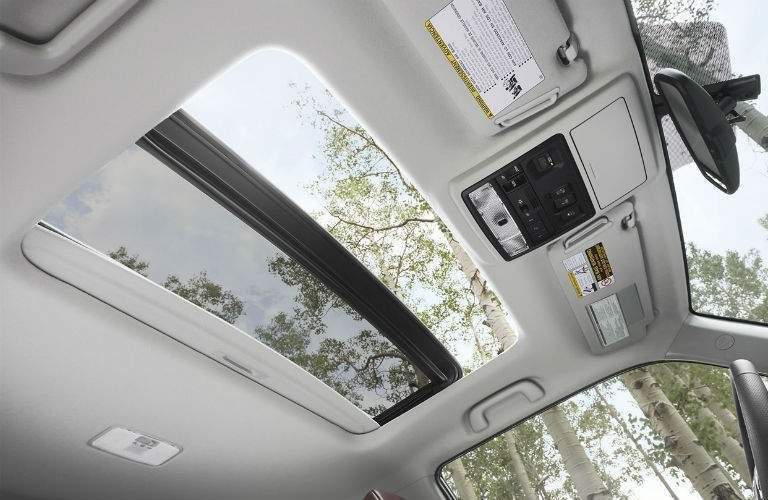 2018 Toyota 4Runner sunroof opening up to view of surrounding trees