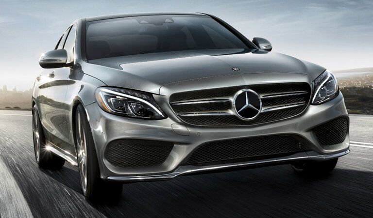 silver 2018 Mercedes-Benz C-Class, close view on the road
