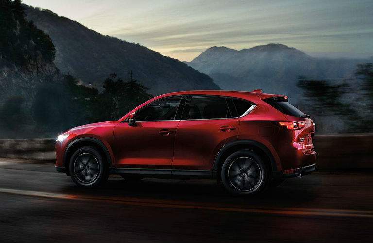 Red 2018 Mazda CX-5 Side Exterior Driving on Mountain Road at Night