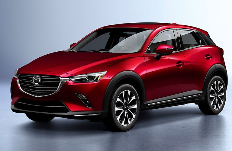 Red 2019 Mazda CX-3 Front Exterior on Gray Background